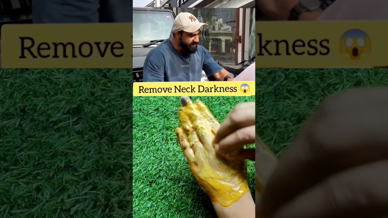 Vyras sėdi prie automobilio viršutinėje dalyje; apačioje ranka tepa geltoną kaukę ant riešo ir delno