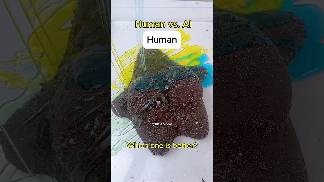 Mažas žvaigždės formos smėlio pyragas, užlietas mėlynais ir geltonais dažais, užrašas „Human“ ir „Which one is better?“