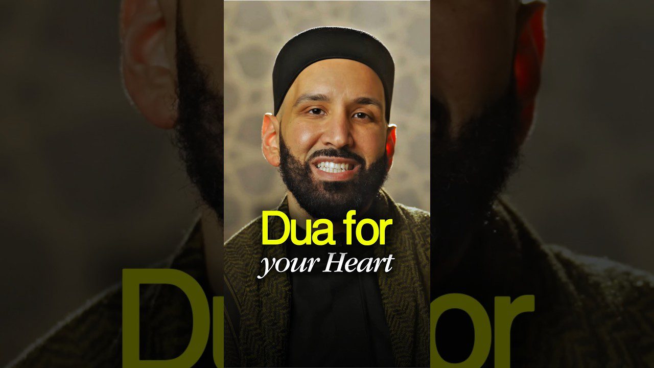 Vyras su barzda ir kepure, tekstas „Dua for your Heart“ žaliu ir baltu šriftu.